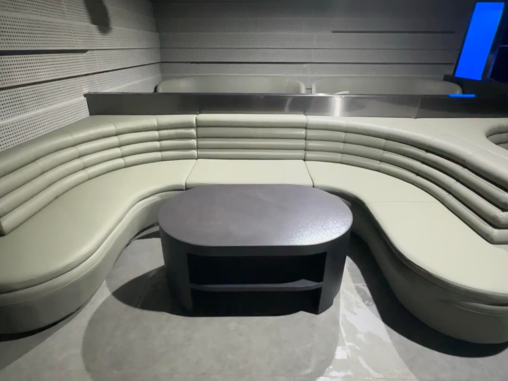 XIANG LIVESHOW close booth view beside perforated acoustic wall panels