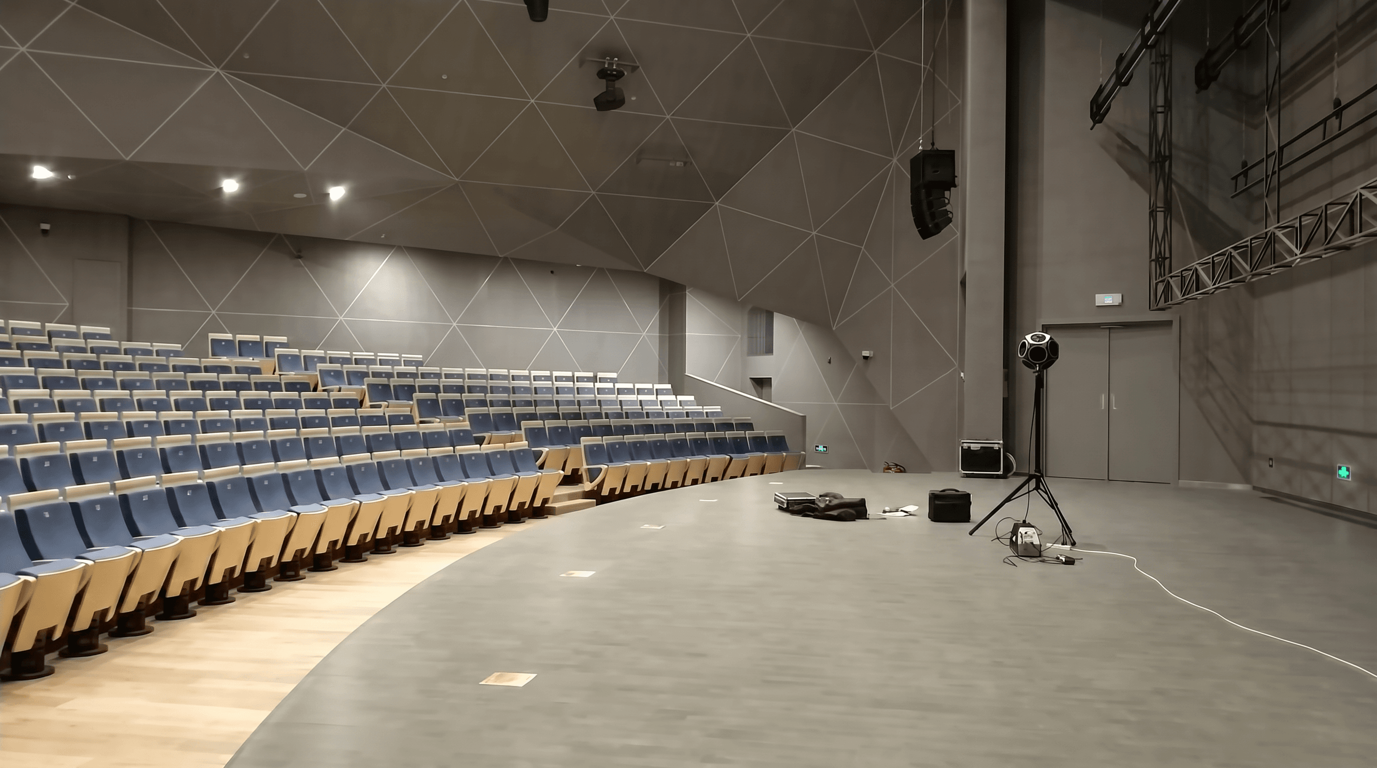 Professional acoustic testing being conducted in the hall