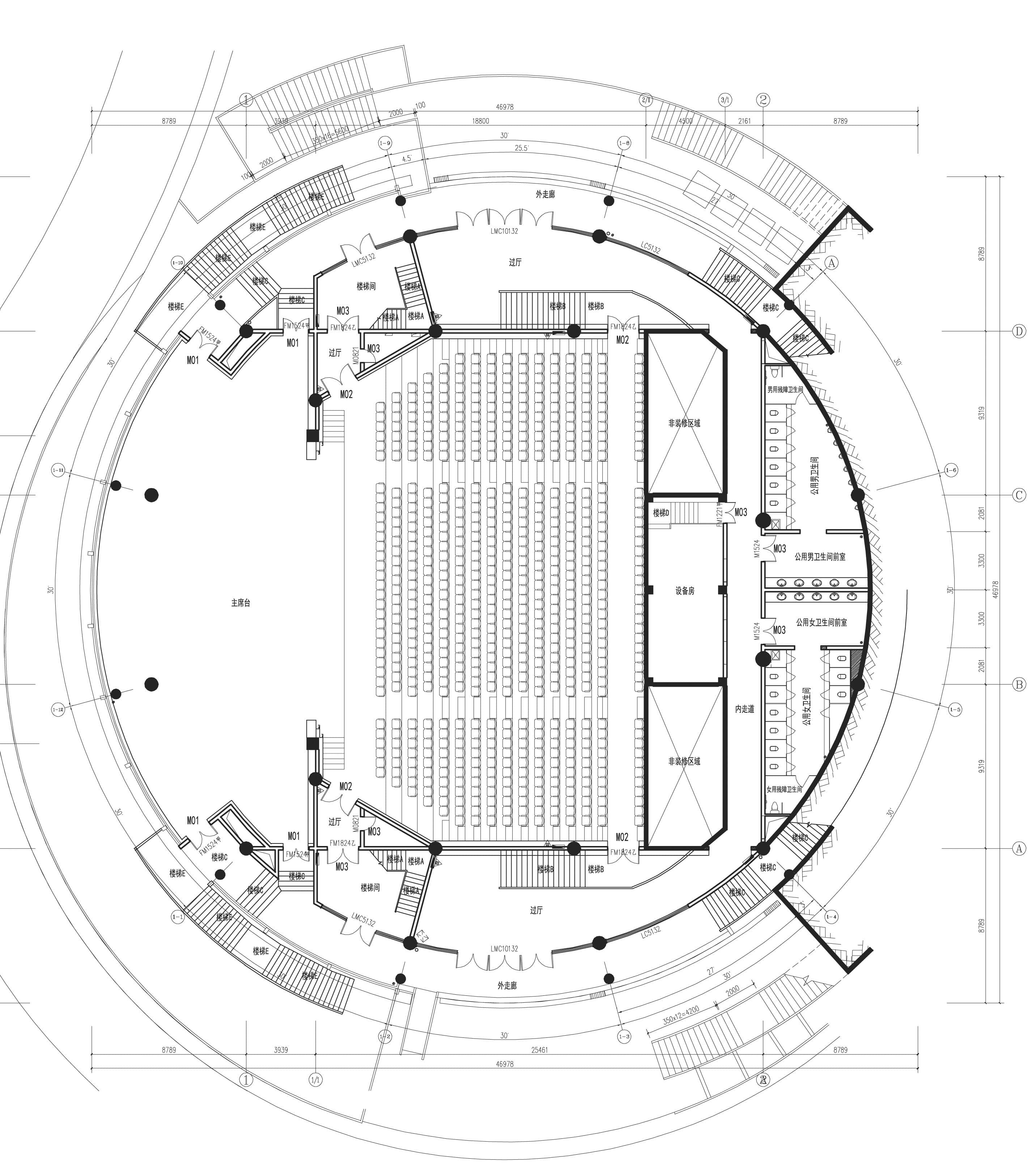 Plan drawing of auditorium seating, stage area, circulation, stairs, and support rooms
