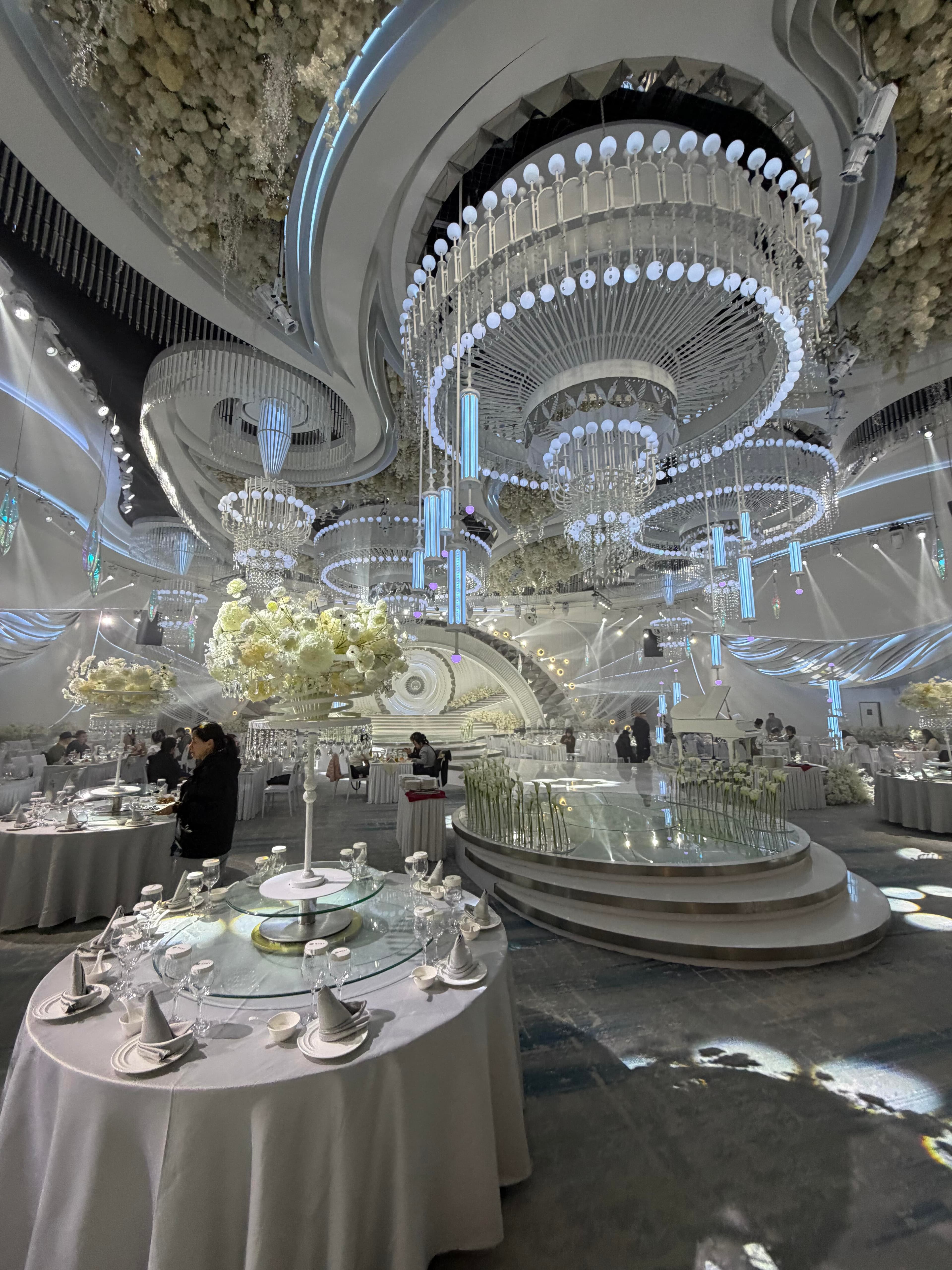 Ice and snow themed ballroom ceiling with concentric ring lighting arrays