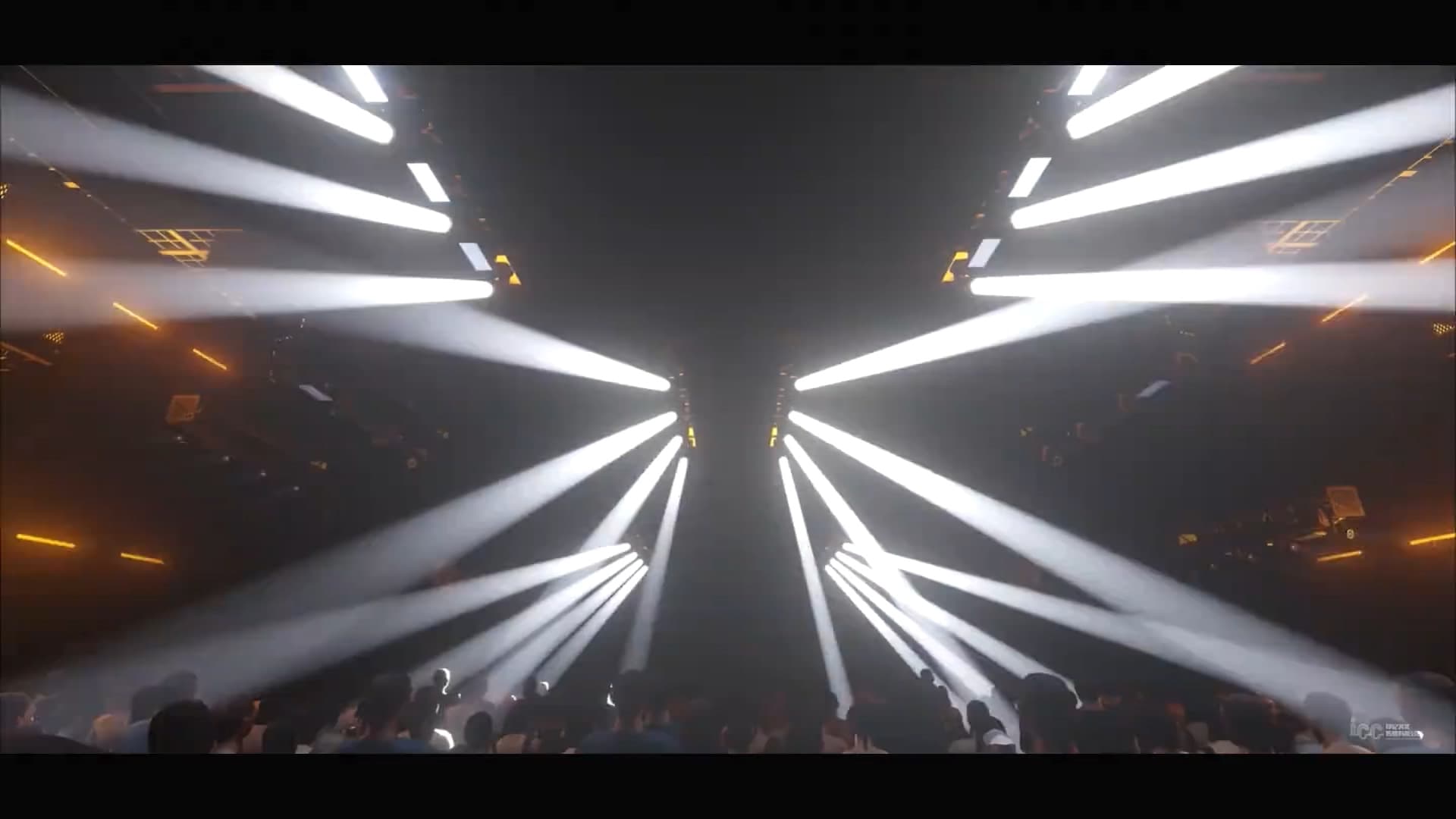 Atlantis Club white beam lighting through haze above audience silhouettes