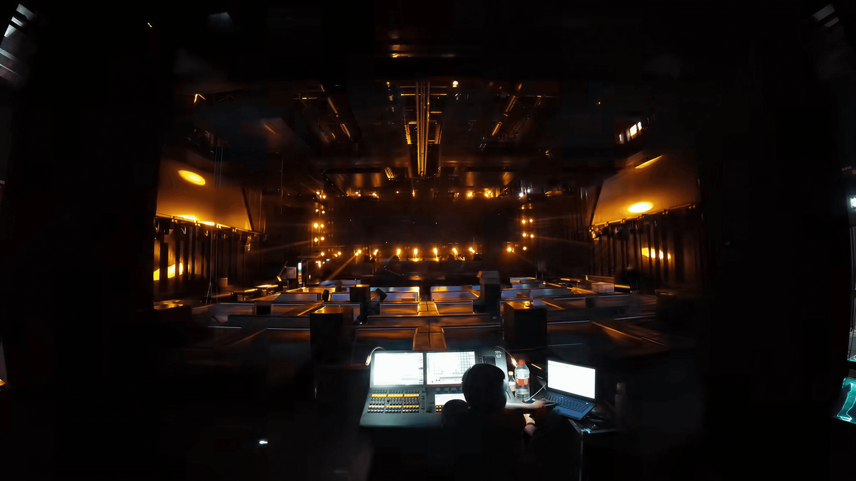 Atlantis Club stage and control position during warm amber lighting operation