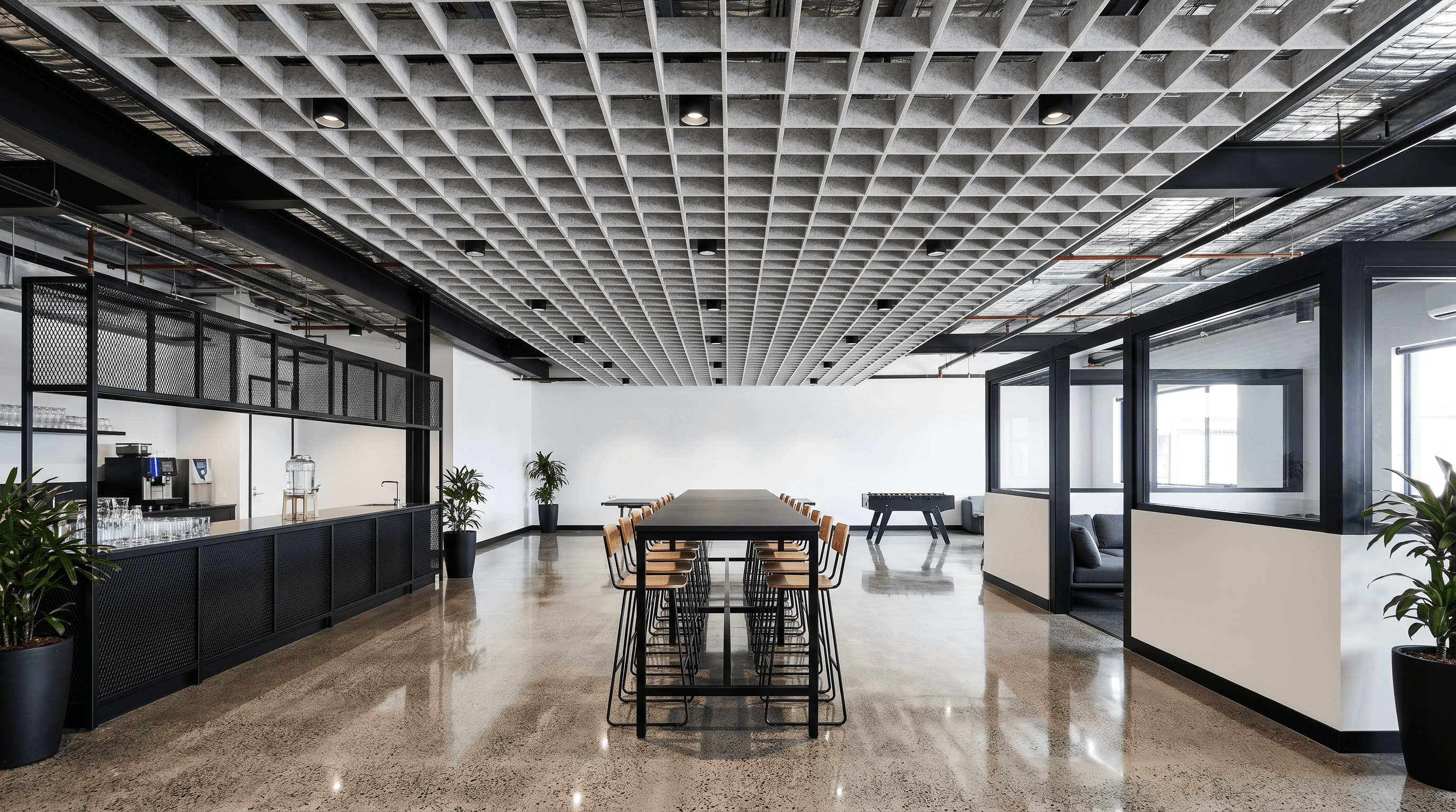 Open workstation area with suspended acoustic grid baffles