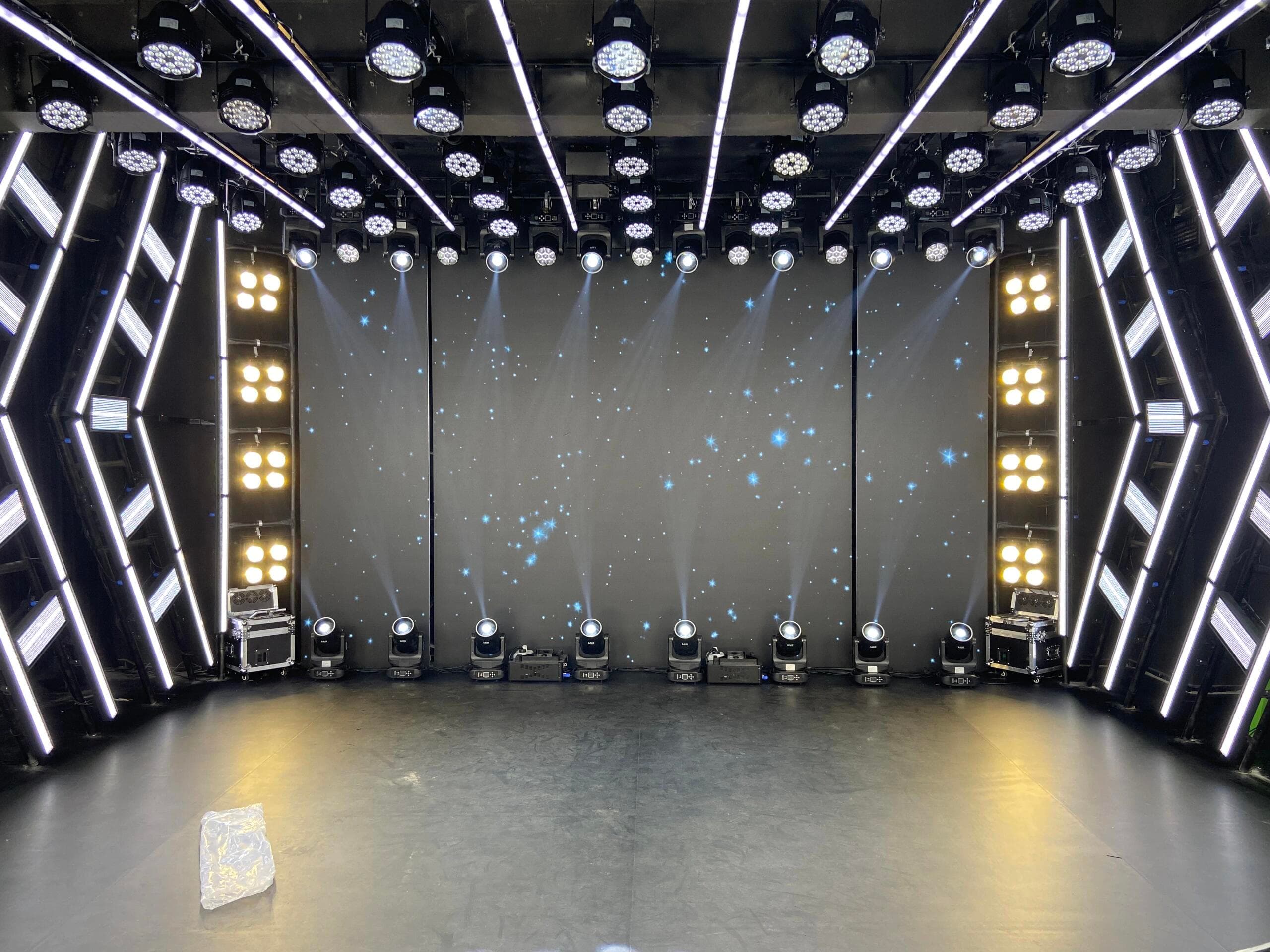 Seamless LED backdrop with starry-sky digital visuals and surrounding lighting frames