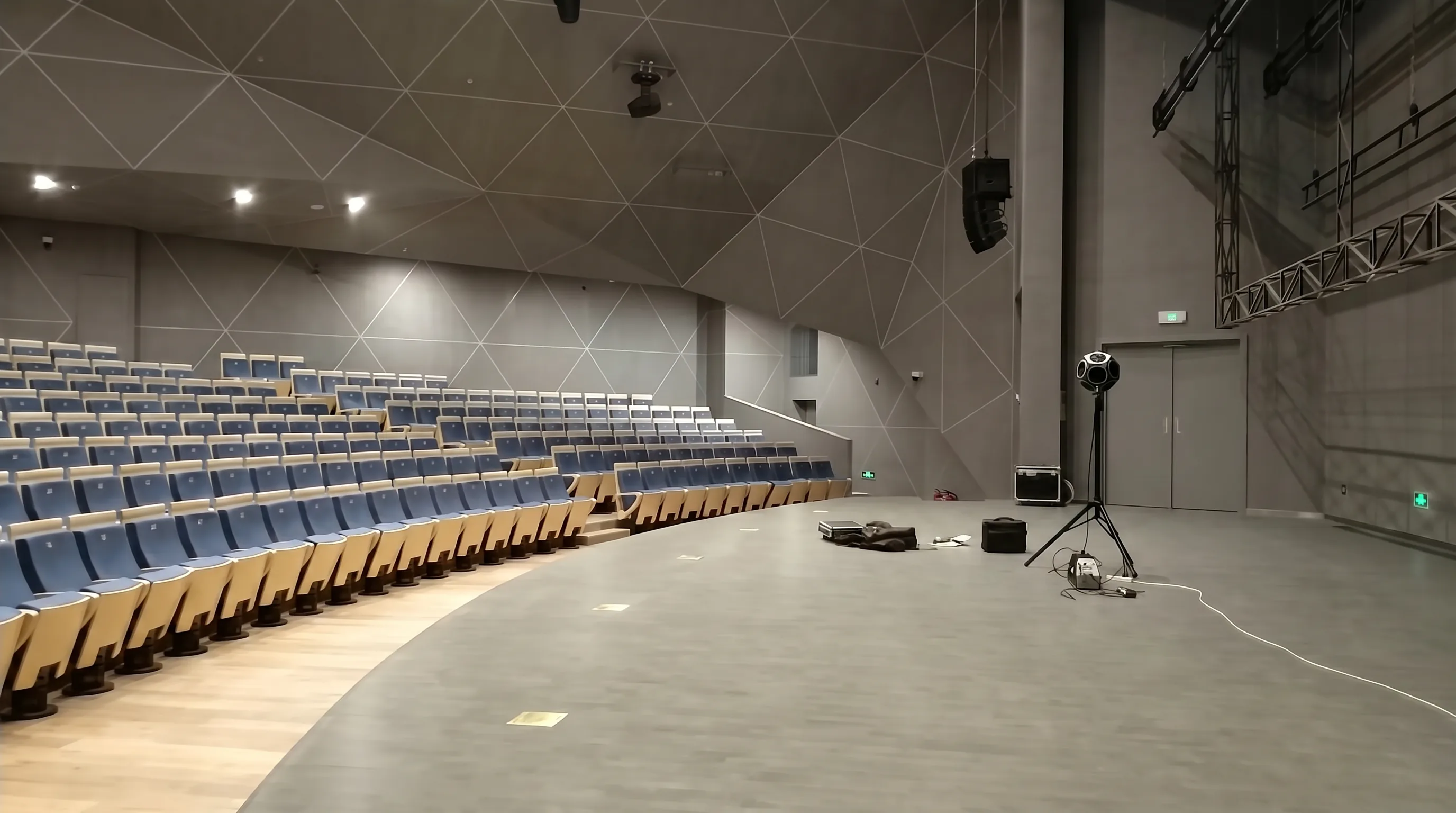 Professional acoustic testing being conducted in the hall
