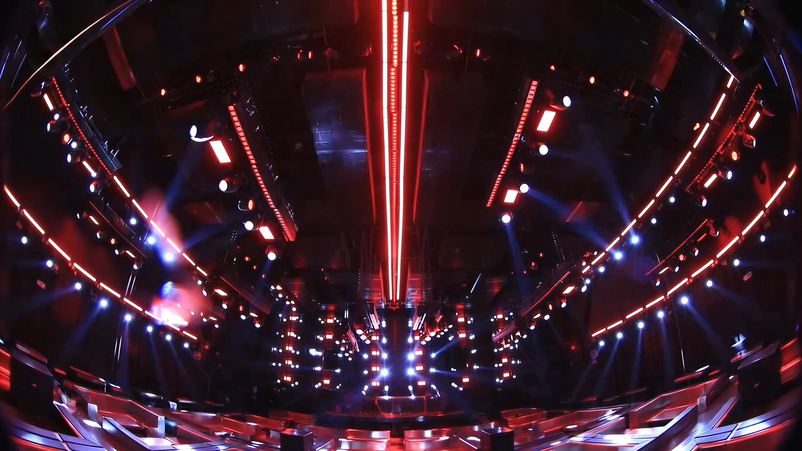 Atlantis Club completed interior with geometric kinetic ceiling and red-blue lighting