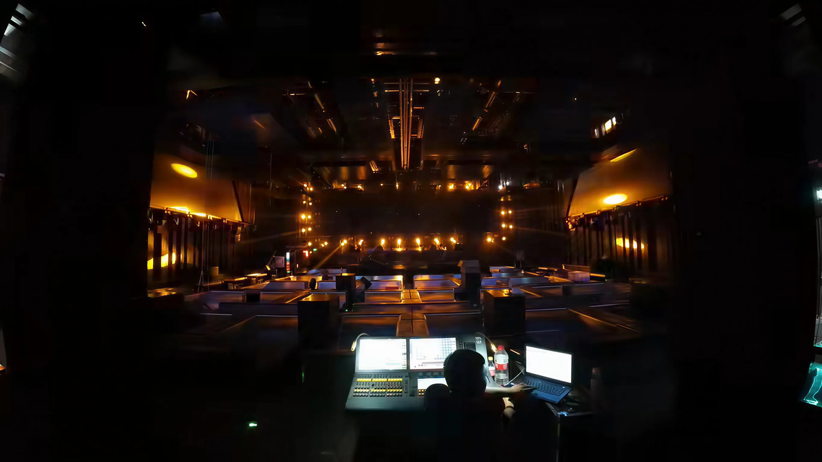 Atlantis Club stage and control position during warm amber lighting operation