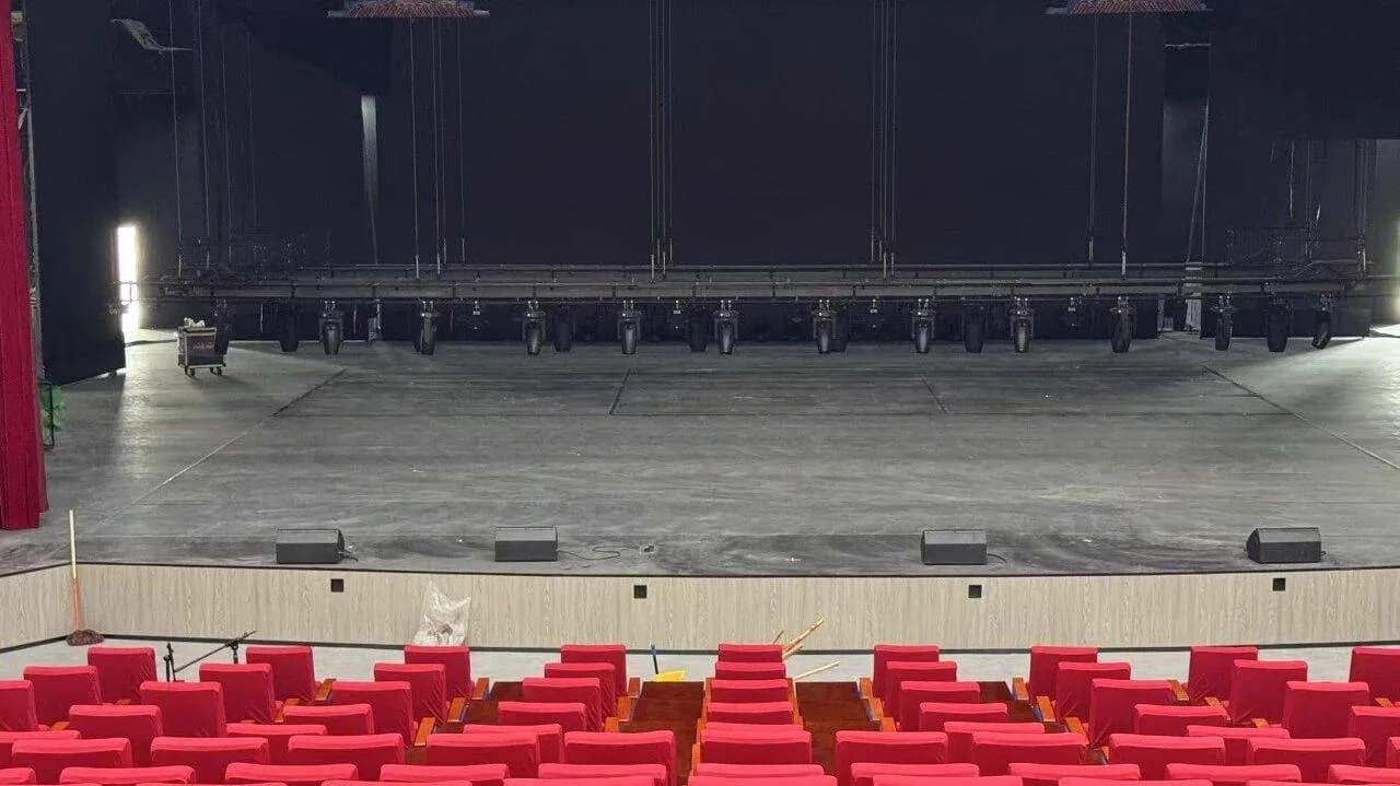 Shule Performing Arts Center view from stage toward audience and stage lip monitors